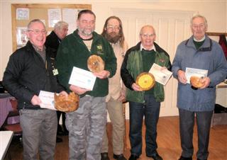 Greg Morton presents the February 2012 certificates to Howard Overton Brian Love Steve Tredwell and Keith Leonard